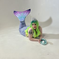 Studio15 - My daughter as a kid always loved Ariel ! Little mermaid was her favorite Disney cartoon / princess.. so def she loved to do this outfit ..
