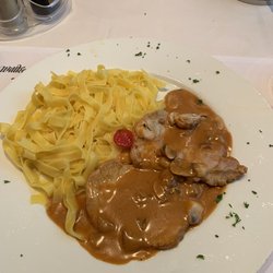 Restaurant Caravelle - Wienerschnitzel with pasta, mushrooms, and sauce