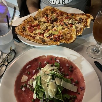 La Te Da Restaurant - Pizza and beef carpaccio at La Te Da outside on the patio. Yum! - New American Near Me - Key West, Florida La Te Da Restaurant - Pizza and beef carpaccio at La Te Da outside on the patio. Yum! - New American Near Me - Key West, Florida