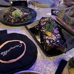 Carajillo - Chicarrón de rib eye con guacamole y baby ribs appetizer