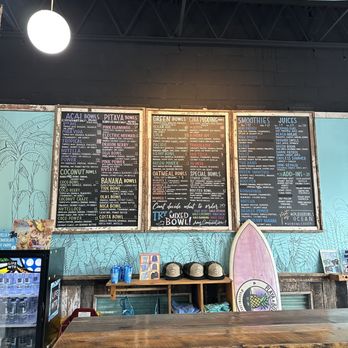 Playa Bowls - a surfboard and menu on the wall - Acai Bowls Near Me - Ocean Township, New Jersey Playa Bowls - a surfboard and menu on the wall - Acai Bowls Near Me - Ocean Township, New Jersey