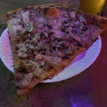 Grinders - Mushroom and sausage slice. Just what I needed. Nothing amazingly fancy but a solid NY style slice for KC - Pizza Near Me - Kansas City, Missouri