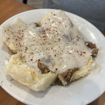 Cafe Fleur De Lis - Biscuits and gravy with sausage - Coffee & Tea Near Me - New Orleans, Louisiana Cafe Fleur De Lis - Biscuits and gravy with sausage - Coffee & Tea Near Me - New Orleans, Louisiana
