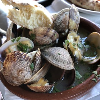 Mioposto - Mini Manila clams in garlic butter wine sauce - Italian Near Me - Seattle, Washington Mioposto - Mini Manila clams in garlic butter wine sauce - Italian Near Me - Seattle, Washington
