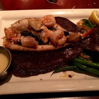 Pappadeaux Seafood Kitchen - Stuffed flounder - comes with shrimp and small crab claws - Seafood Near Me - Houston, Texas
