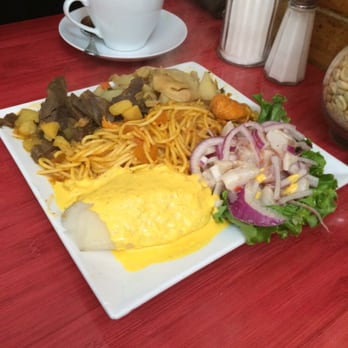 La Casa De Rosita - a plate of food on a table - Peruvian Near Me - Passaic, New Jersey