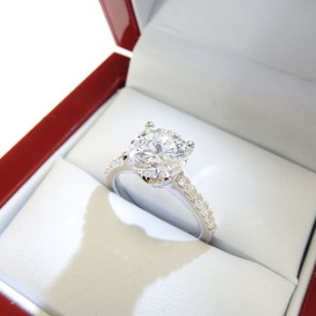 Diamond Net - Classic Four-Prong Diamond Engagement Ring with Side Diamonds - Jewelry Near Me - Vancouver, British Columbia Diamond Net - Classic Four-Prong Diamond Engagement Ring with Side Diamonds - Jewelry Near Me - Vancouver, British Columbia