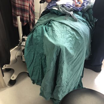 MiKO Plastic Surgery - Patient coordinator acting as nurse. No gloves used. - Cosmetic Surgeons Near Me - Beverly Hills, California MiKO Plastic Surgery - Patient coordinator acting as nurse. No gloves used. - Cosmetic Surgeons Near Me - Beverly Hills, California