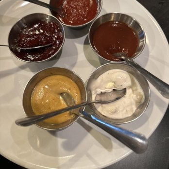 Simply Dipped Fondue - Dipping sauces (Gorgonzola, honey mustard, bbq sauce, spiced cherry raspberry, and cocktail sauce for by the sea) - Fondue Near Me - Fredericksburg, Texas