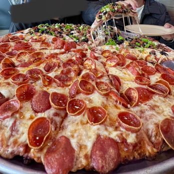 Mountain Mike's Pizza - half Sizlin' Bacon and pepperoni - Pizza Near Me - Oxnard, California Mountain Mike's Pizza - half Sizlin' Bacon and pepperoni - Pizza Near Me - Oxnard, California