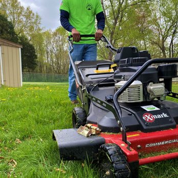 Green Branch Landscaping - a man using a lawn mower - Lawn Services Near Me Green Branch Landscaping - a man using a lawn mower - Lawn Services Near Me