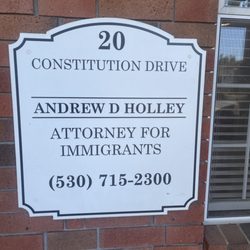 Andrew D Holley