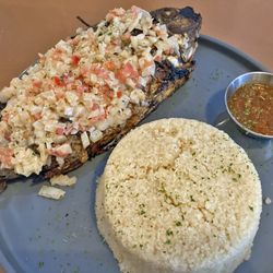 Grilled Fish (Tilapia) with attiéké (cassava couscous)