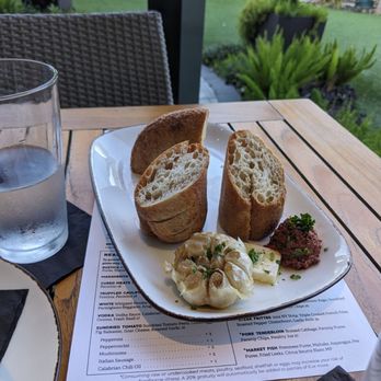 Midtown Table - Bread plate, lasagna, and linguine. - Italian Near Me - Jacksonville, Florida Midtown Table - Bread plate, lasagna, and linguine. - Italian Near Me - Jacksonville, Florida