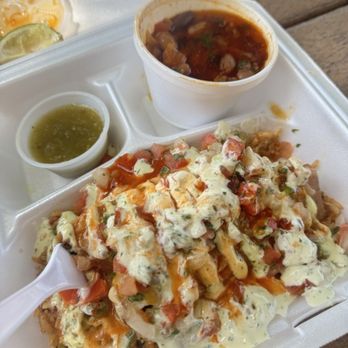 Good Gollie Tamales - Brisket Tamale combo on a bed of rice with side of Ranchero Beans and salsa verde - Comfort Food Near Me - Van Alstyne, Texas