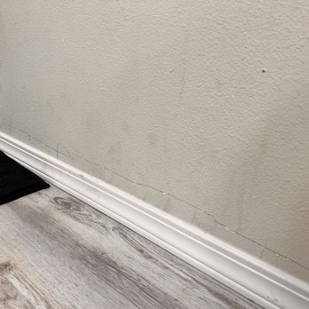 ABC Remodeling - Big scratch on my wall - Damage Restoration Near Me