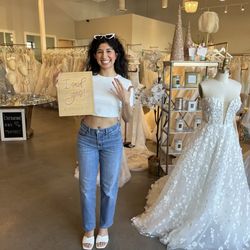 "I said yes" plaque and a happy bride