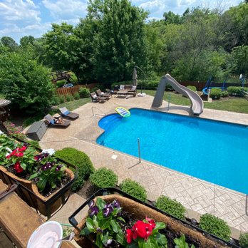 Evergreen Landscape Associates LLC - a view of a swimming pool - Snow Removal Near Me - Hampshire, Illinois Evergreen Landscape Associates LLC - a view of a swimming pool - Snow Removal Near Me - Hampshire, Illinois