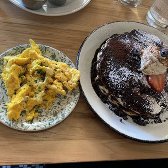 The Great Commoner - Side of eggs and chocolate chip pancakes with side of burnt cinnamon whipped cream. - Breakfast & Brunch Near Me - Dearborn, Michigan The Great Commoner - Side of eggs and chocolate chip pancakes with side of burnt cinnamon whipped cream. - Breakfast & Brunch Near Me - Dearborn, Michigan