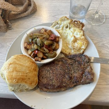 Biscuits-n-Jam - Steak eggs and potatoes with onions and a biscuit. 10/10 - Breakfast & Brunch Near Me - Memphis, Tennessee