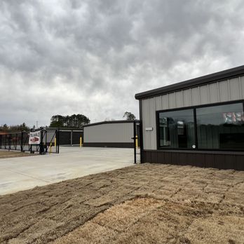 Reliable Storage - Gated entrance provides peace of mind knowing your valuables are secure.  Text-to-open gate feature allows renters 24-hour access. - Self Storage Near Me - Calhoun, Georgia