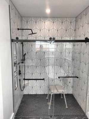 Tile & Flooring Services - Tile installation and repair begins with ensuring the substrate is rigid, since deflection causes grout cracks and tile separation regardless of material quality. Flooring upgrades include removing old vinyl or tile down to the subfloor, verifying the surface is level within industry tolerances, and installing cement board in wet areas to prevent moisture transmission. Vanity installation involves connecting supply lines and drain assemblies with accessible shutoffs, then securing cabinets to wall studs so countertop weight doesn't create sag over time.
After flooring and tile work, you'll notice water sheets off surfaces toward drains without creating standing puddles, and grout remains intact even in high-traffic thresholds because proper thinset coverage prevents voids that allow tiles to flex independently. Faucets and shower valves operate through their full range without stiffness, since new cartridges seat correctly in valve bodies without the mineral buildup that restricts older assemblies.
Remodeling work focuses on fixture and finish updates rather than plumbing relocation or structural modifications, which require permits and licensed trade contractors. This service includes cosmetic and functional improvements within the existing bathroom footprint, not layout changes or additions. Tile & Flooring Services - Tile installation and repair begins with ensuring the substrate is rigid, since deflection causes grout cracks and tile separation regardless of material quality. Flooring upgrades include removing old vinyl or tile down to the subfloor, verifying the surface is level within industry tolerances, and installing cement board in wet areas to prevent moisture transmission. Vanity installation involves connecting supply lines and drain assemblies with accessible shutoffs, then securing cabinets to wall studs so countertop weight doesn't create sag over time.
After flooring and tile work, you'll notice water sheets off surfaces toward drains without creating standing puddles, and grout remains intact even in high-traffic thresholds because proper thinset coverage prevents voids that allow tiles to flex independently. Faucets and shower valves operate through their full range without stiffness, since new cartridges seat correctly in valve bodies without the mineral buildup that restricts older assemblies.
Remodeling work focuses on fixture and finish updates rather than plumbing relocation or structural modifications, which require permits and licensed trade contractors. This service includes cosmetic and functional improvements within the existing bathroom footprint, not layout changes or additions.