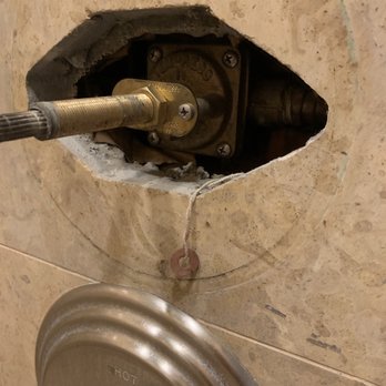 Vanguard Plumbing - Master shower leaking water. Look at bottom screw and you will see water drop. - Plumbing Near Me Vanguard Plumbing - Master shower leaking water. Look at bottom screw and you will see water drop. - Plumbing Near Me