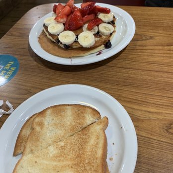Denny's - Pancakes with fruit added on and toast - Diners Near Me - Rowland Heights, California Denny's - Pancakes with fruit added on and toast - Diners Near Me - Rowland Heights, California