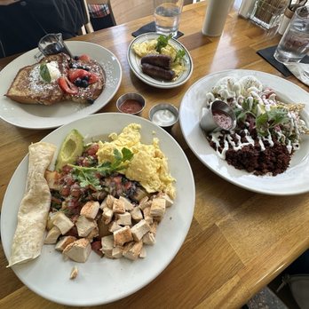Madi - Papas Locas (bottom left), Chilaquiles w/ soy chorizo (bottom right), French Toast (top) - Breakfast & Brunch Near Me - San Diego, California Madi - Papas Locas (bottom left), Chilaquiles w/ soy chorizo (bottom right), French Toast (top) - Breakfast & Brunch Near Me - San Diego, California