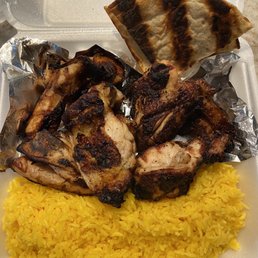 Half chicken with yellow rice