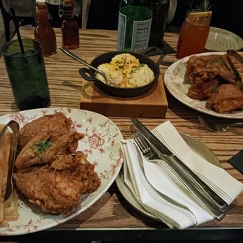 Yardbird - Chicken and waffles. Grits with cheddar cheese. - Southern Near Me - Las Vegas, Nevada Yardbird - Chicken and waffles. Grits with cheddar cheese. - Southern Near Me - Las Vegas, Nevada