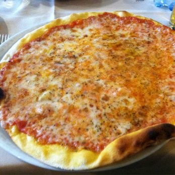 Naumachia - cheese pizza. not terrible, but a bit too oily. - Italian Near Me - Rome, RM
