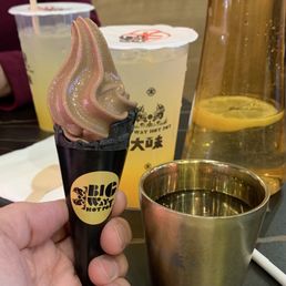 Complimentary mango beverage and ice cream