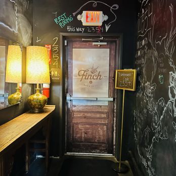 Finch - If you're looking at the kitchen, the entrance to the bathroom area is to the right. Note the code. - American Near Me - Wildomar, California