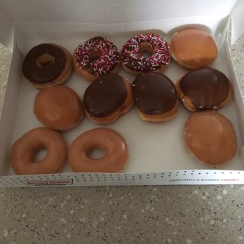 Krispy Kreme - Somebody couldn't wait to try one! - Donuts Near Me - Utica, Michigan Krispy Kreme - Somebody couldn't wait to try one! - Donuts Near Me - Utica, Michigan