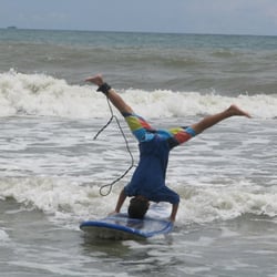 Surf Lessons Florida - First surf lesson and already doing headstands!