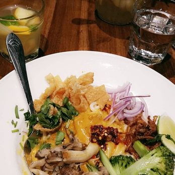 B Star - Vegan coconut curry tempeh noodles and fiery basil chicken (in the background) - Burmese Near Me - San Francisco, California B Star - Vegan coconut curry tempeh noodles and fiery basil chicken (in the background) - Burmese Near Me - San Francisco, California