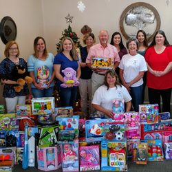 Marianna Health & Wellness - Christmas in July supporting Guardian ad Litem!