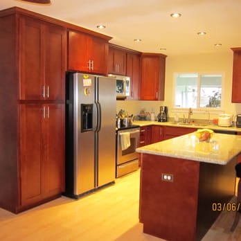 Impressive Kitchen & Bath - a modern kitchen with stainless steel appliances - General Contractors Near Me - Fremont, California Impressive Kitchen & Bath - a modern kitchen with stainless steel appliances - General Contractors Near Me - Fremont, California