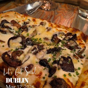 NAPA Kitchen + Bar Dublin - Roasted Mushroom  roasted shiitake and portabella mushrooms, roasted garlic oil, garlic confit, shallots, fontina - New American Near Me - Dublin, Ohio