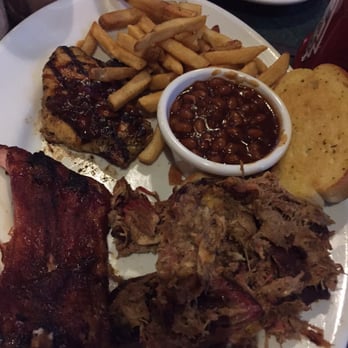 Smokey Bones - 1/3 baby back ribs, bourbon bbq chicken, pulled pith & dude if fries, baked beans & garlic bread - Barbeque Near Me - cheektowaga, New York Smokey Bones - 1/3 baby back ribs, bourbon bbq chicken, pulled pith & dude if fries, baked beans & garlic bread - Barbeque Near Me - cheektowaga, New York