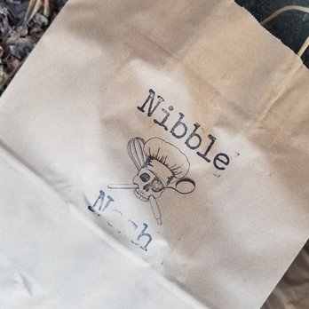 NibblexNosh - a paper bag on the ground - Bakeries Near Me - Scotia, New York
