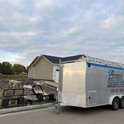 Stokes Seamless - Hardie siding going up!