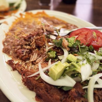 Old Town Mexican Cafe - Carnitas plate with stuff on top. - Mexican Near Me - San Diego, California Old Town Mexican Cafe - Carnitas plate with stuff on top. - Mexican Near Me - San Diego, California