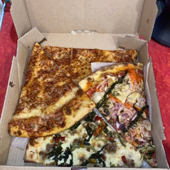 Two Boots - My Brilliant Friend (Meat Slice) (bottom left), V for Vegan (Veggie Slice) (bottom right), Cheese Slice (top left and right) - Pizza Near Me - New York, New York Two Boots - My Brilliant Friend (Meat Slice) (bottom left), V for Vegan (Veggie Slice) (bottom right), Cheese Slice (top left and right) - Pizza Near Me - New York, New York