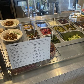 CAVA - Toppings station - Mediterranean Near Me - Harahan, Louisiana CAVA - Toppings station - Mediterranean Near Me - Harahan, Louisiana