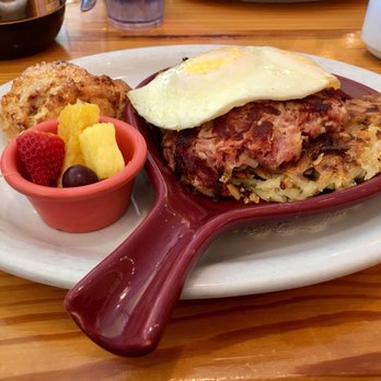 Skillets - Naples - The Strand - Corned beef hash skillet with chocolate chip banana scone. Amazing! - Breakfast & Brunch Near Me - Naples, Florida Skillets - Naples - The Strand - Corned beef hash skillet with chocolate chip banana scone. Amazing! - Breakfast & Brunch Near Me - Naples, Florida