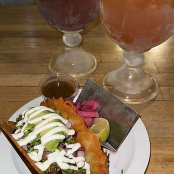 La Bonita's - Cheesy carne asada taco, michelada, and strawberry watermelon spicy margarita. - Mexican Near Me - Palm Springs, California