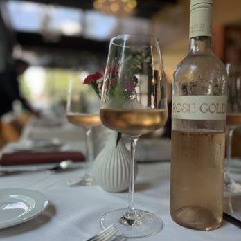 Brasserie du Parc - a glass of rose wine and a bottle of wine - Brasseries Near Me - Houston, Texas Brasserie du Parc - a glass of rose wine and a bottle of wine - Brasseries Near Me - Houston, Texas