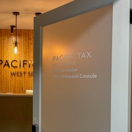 Exterior outside entrance of Pacific Tax West Seattle - Entrance to Pacific Tax West Seattle on the second floor in the Waterfront Credit Union Office Building. - Seattle, Washington Exterior outside entrance of Pacific Tax West Seattle - Entrance to Pacific Tax West Seattle on the second floor in the Waterfront Credit Union Office Building. - Seattle, Washington